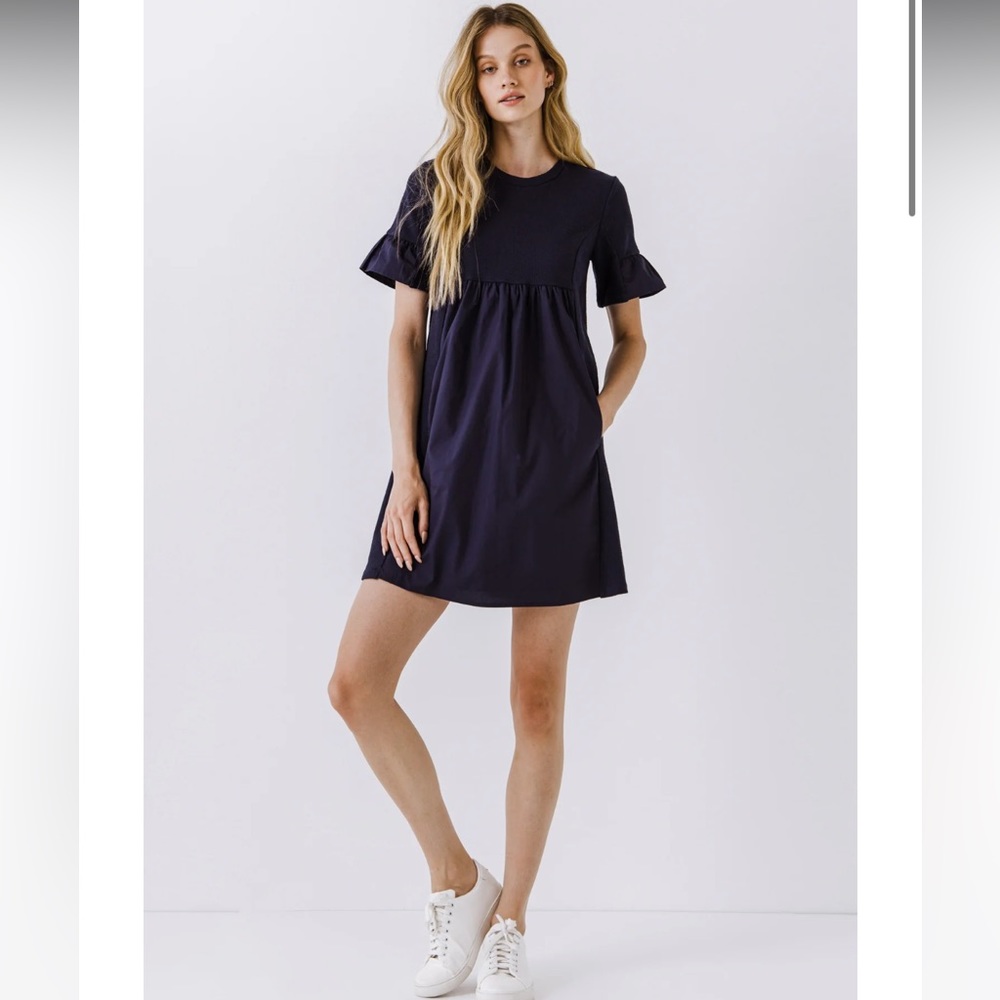 Size small used condition MIXED MEDIA SHORT-SLEEVE MINI DRESS navy with pockets